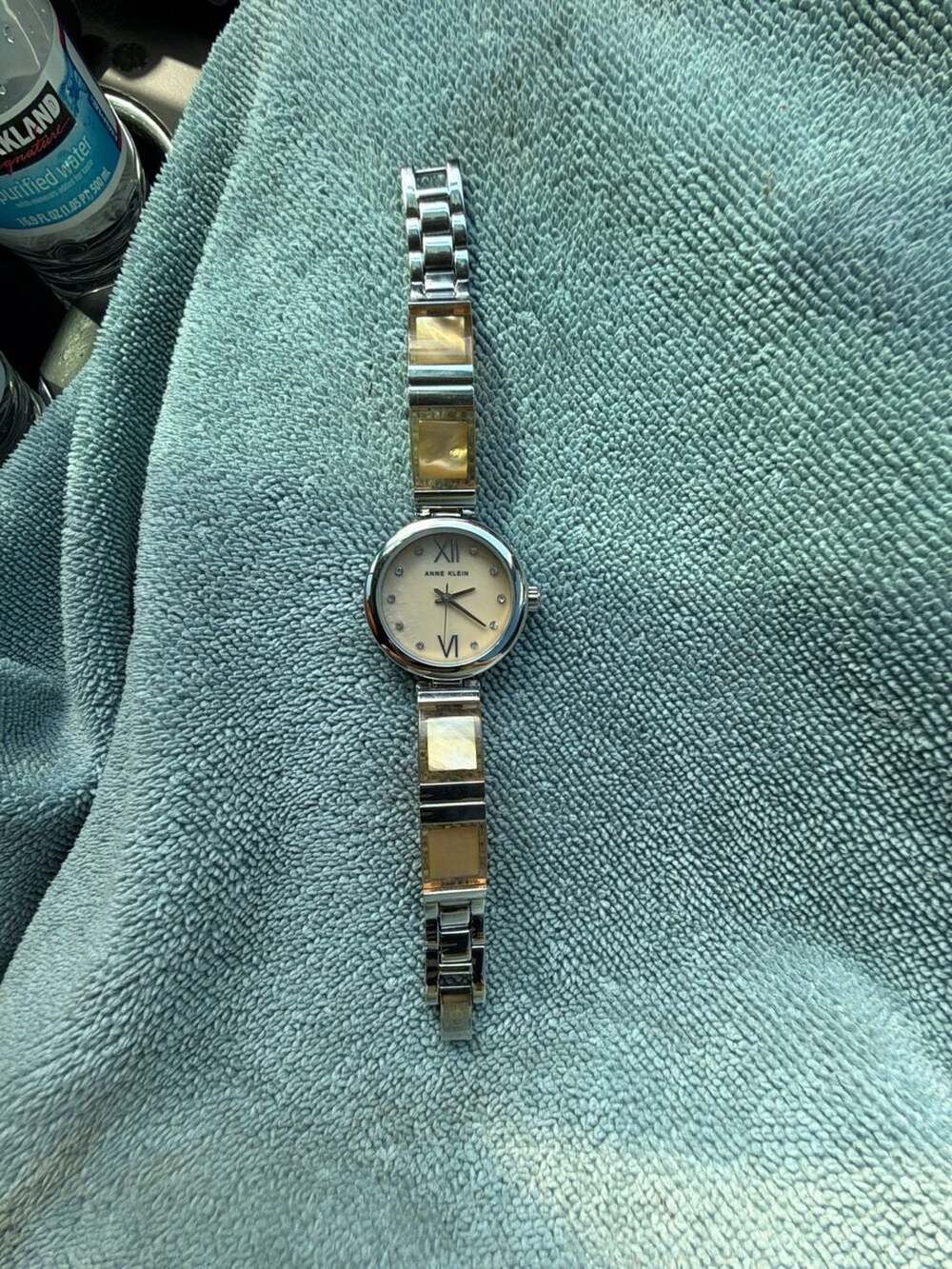 Anne Klein Women's Silver-Tone Bracelet Watch AK/2749 with Amber Resin and Mothe